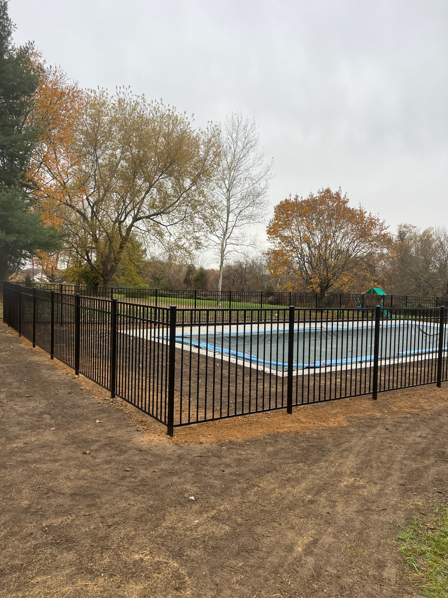Aluminum fence on a slope