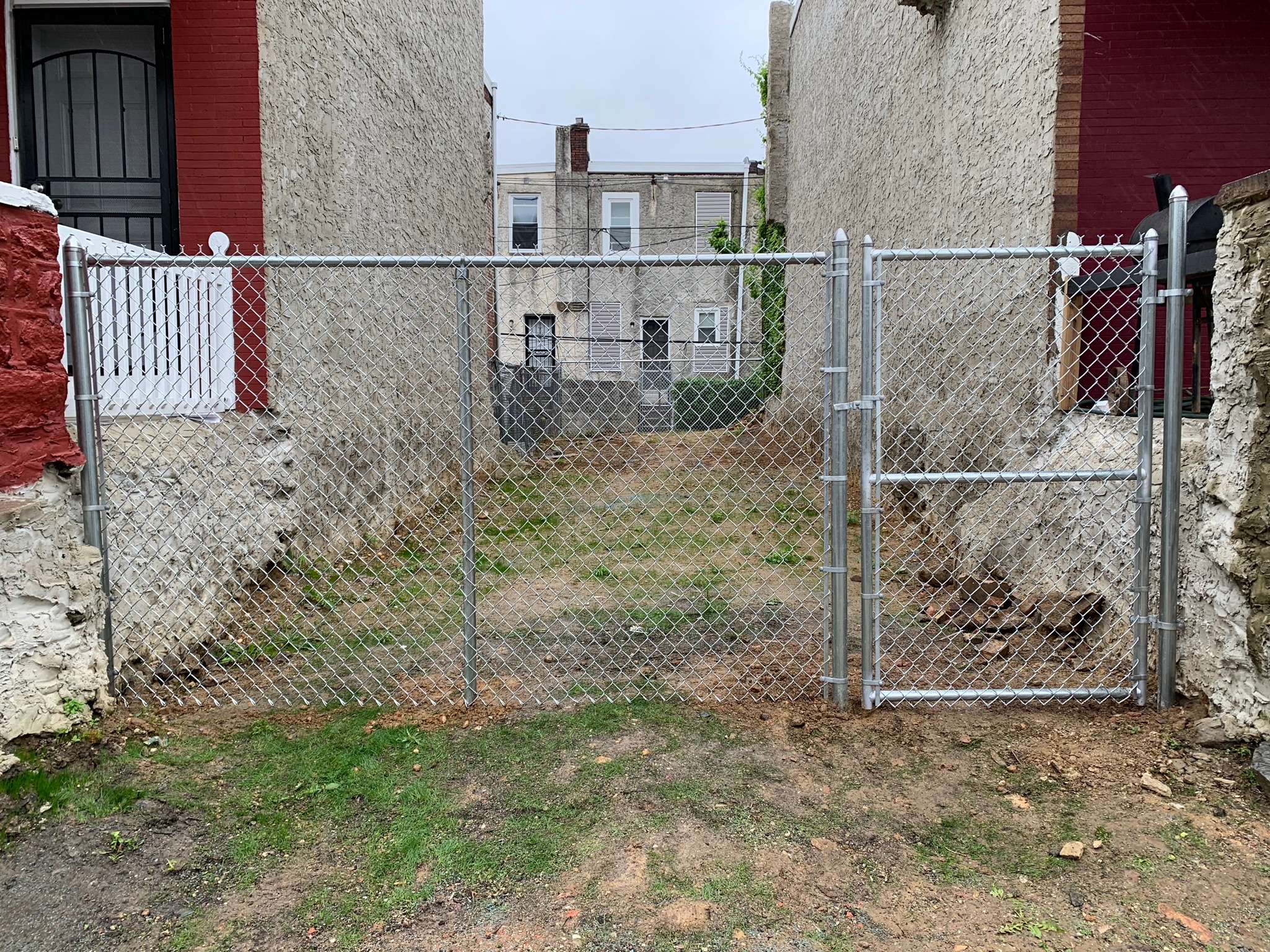 Silver chain link gate close-up